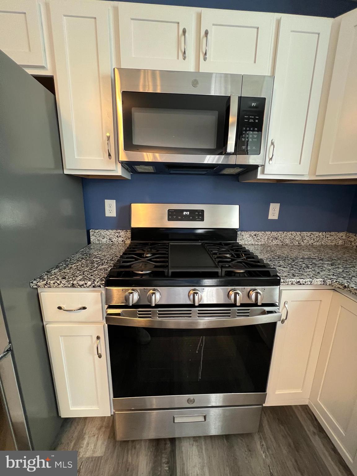 2317 Bartlett Road Harrisburg, PA 17110 - Photo 22 of 59 a stove top oven sitting inside of a kitchen
