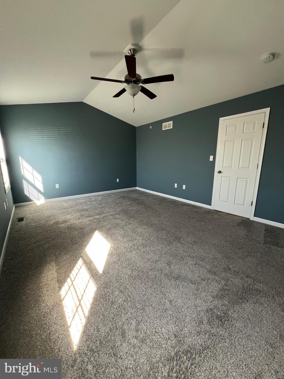 2317 Bartlett Road Harrisburg, PA 17110 - Photo 29 of 59 a view of empty room with windows and ceiling fan