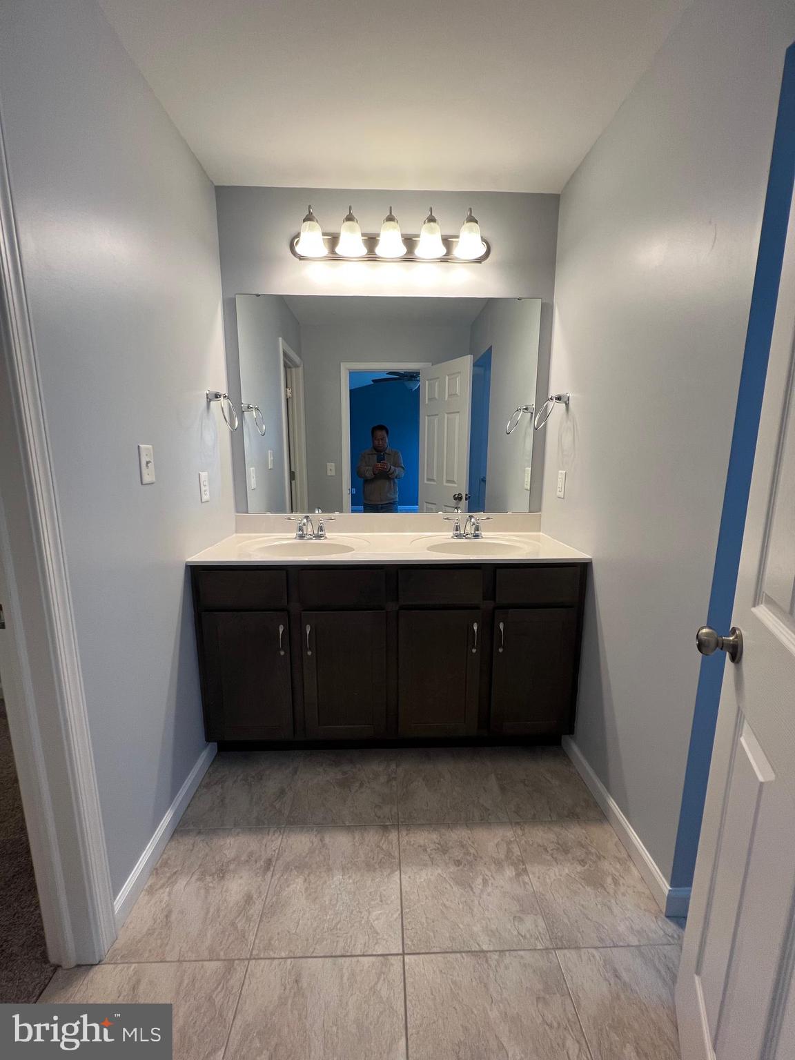 2317 Bartlett Road Harrisburg, PA 17110 - Photo 31 of 59 a bathroom with a sink vanity and a mirror
