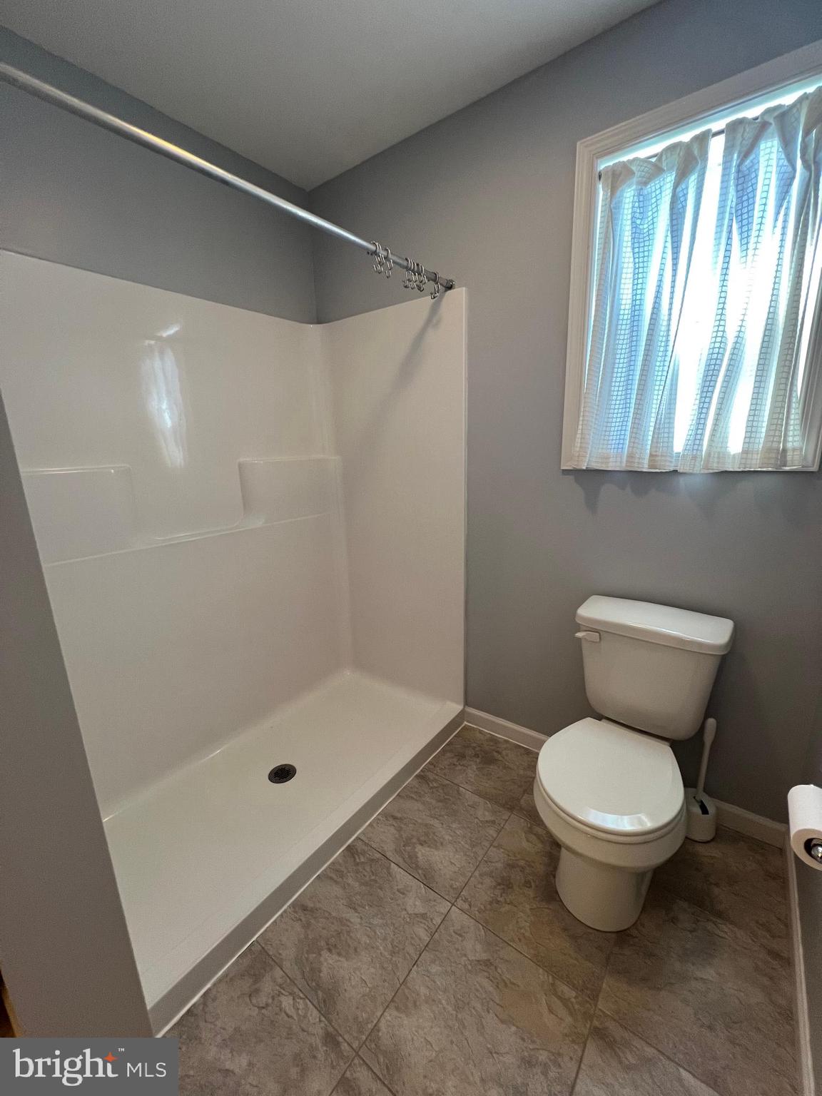 2317 Bartlett Road Harrisburg, PA 17110 - Photo 35 of 59 a bathroom with a toilet and a shower