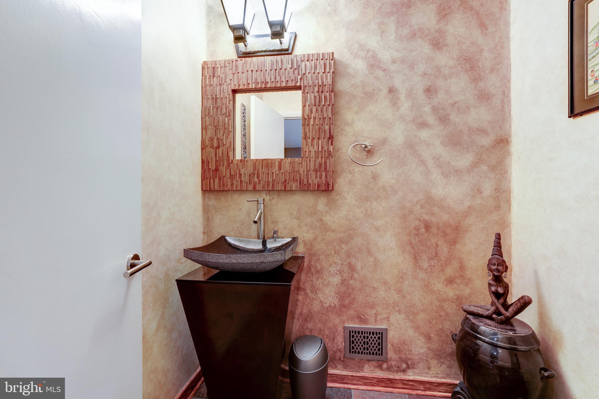 1407 Aldenham Lane Reston, VA 20190 - Photo 13 of 56 Powder room with Bali theme