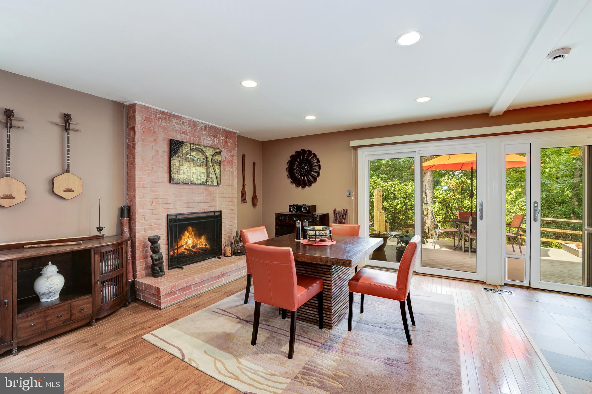 1407 Aldenham Lane Reston, VA 20190 - Photo 21 of 56 Dining room with Gas log fireplace