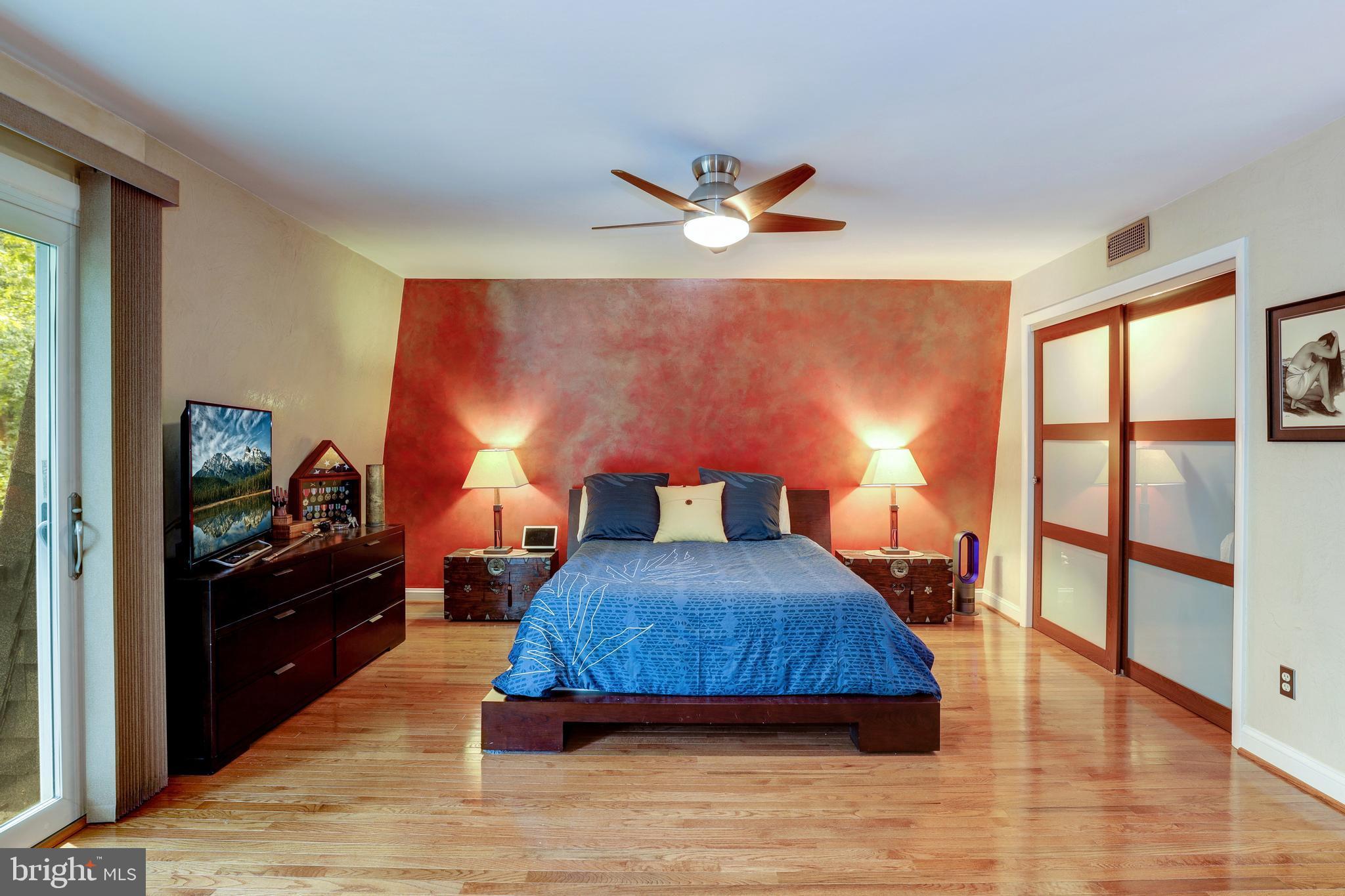 1407 Aldenham Lane Reston, VA 20190 - Photo 28 of 56 Master bedroom suite with sliding door closet