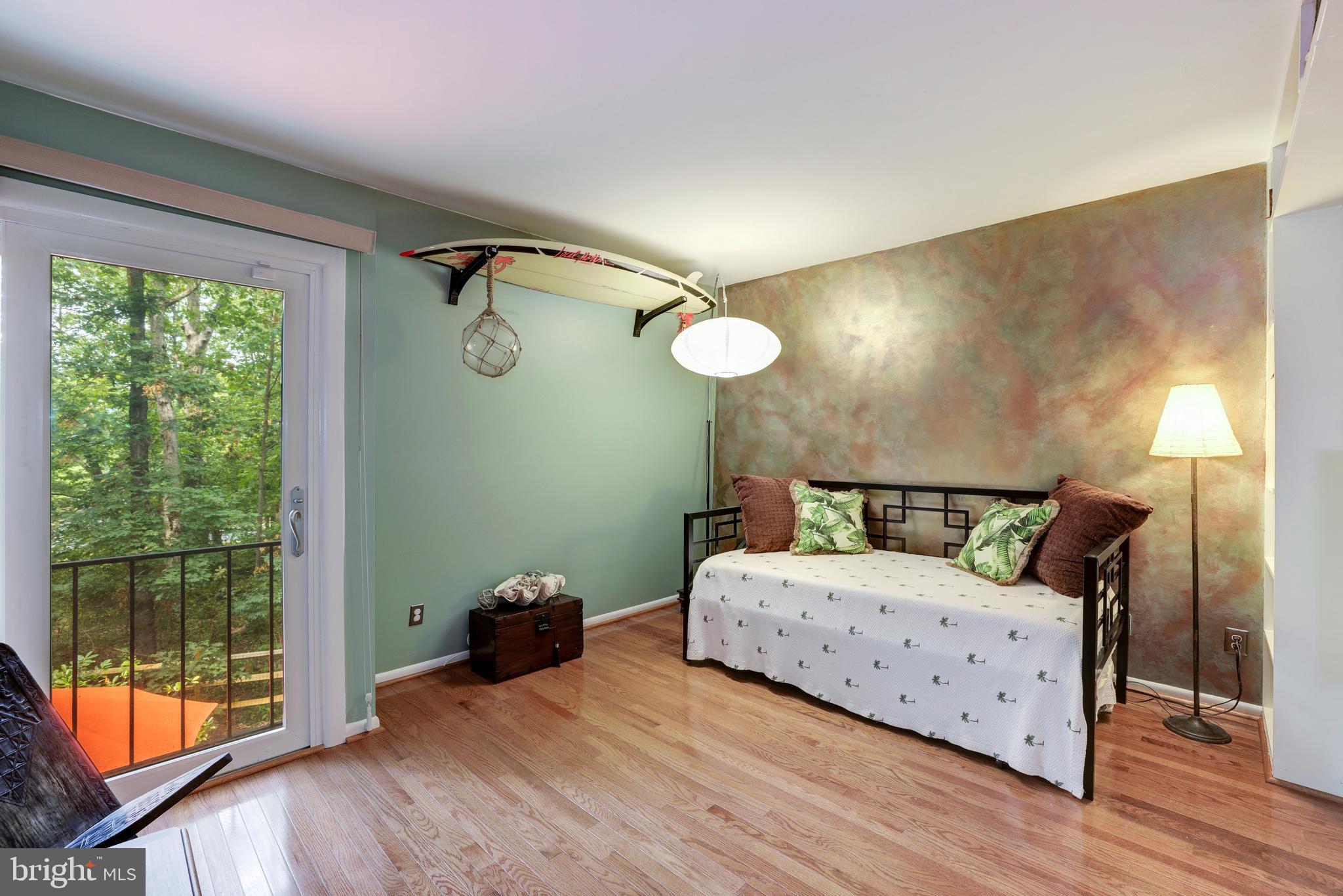 1407 Aldenham Lane Reston, VA 20190 - Photo 37 of 56 third bedroom custom wall paint and large window