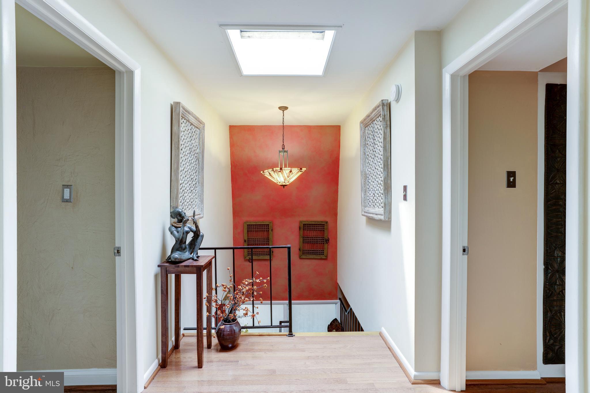 1407 Aldenham Lane Reston, VA 20190 - Photo 42 of 56 Hallway with skylight for full natural light