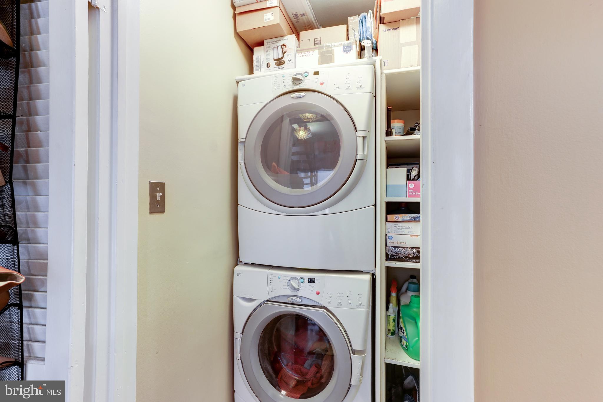 1407 Aldenham Lane Reston, VA 20190 - Photo 43 of 56 Main-level stacked washer/dryer