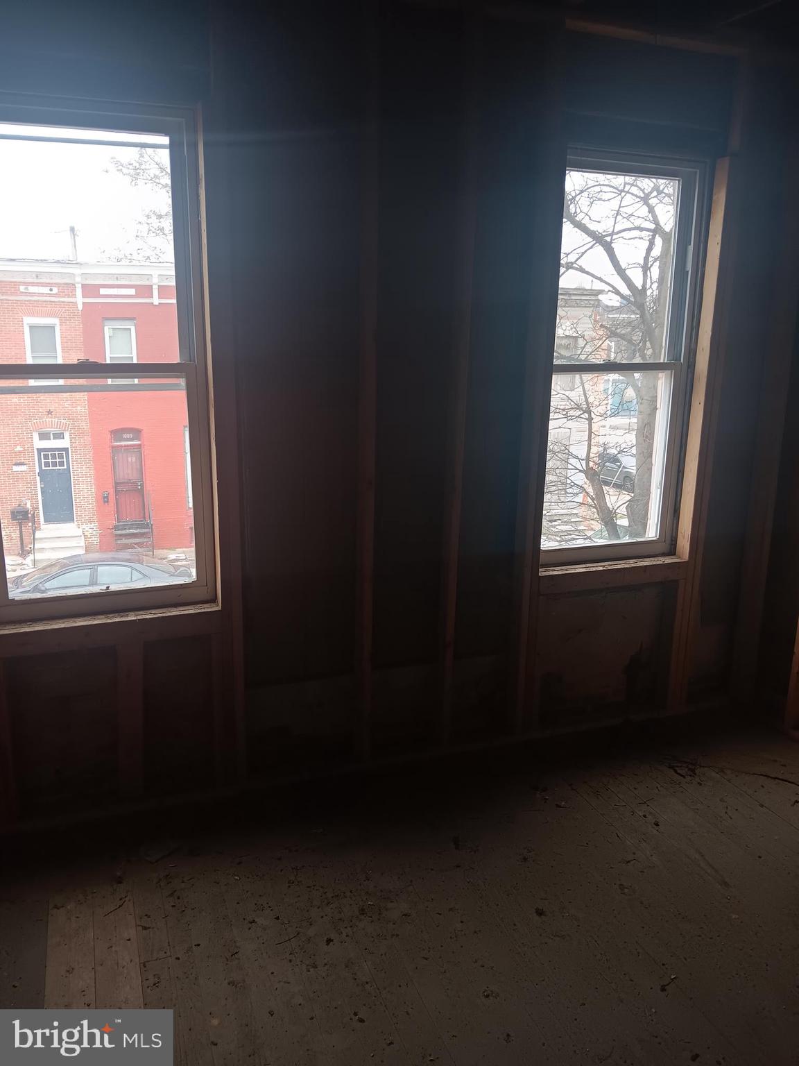 1008 East Biddle Street Baltimore, MD 21202 - Photo 3 of 12 a view of an empty room with a window