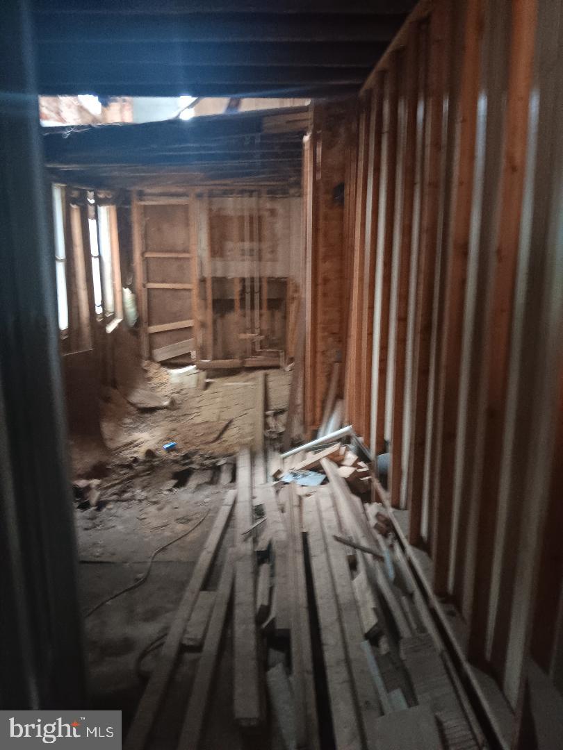 1008 East Biddle Street Baltimore, MD 21202 - Photo 6 of 12 a view of living room and wooden floor