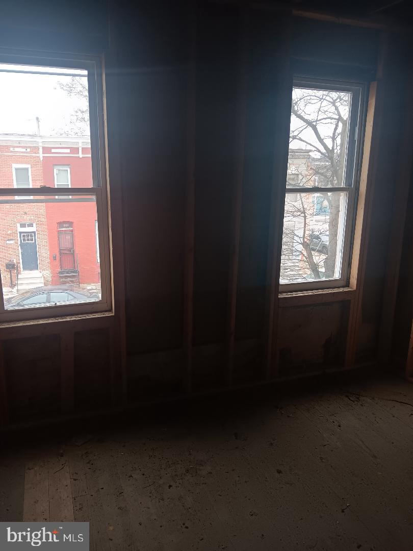 1008 East Biddle Street Baltimore, MD 21202 - Photo 8 of 12 a view of an empty room with a window