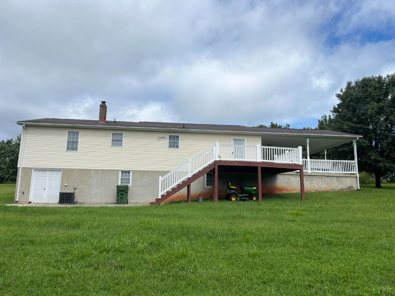 2135 Spring Garden Road Chatham, VA 24531 - Photo 17 of 18 a view of an house with backyard space and balcony