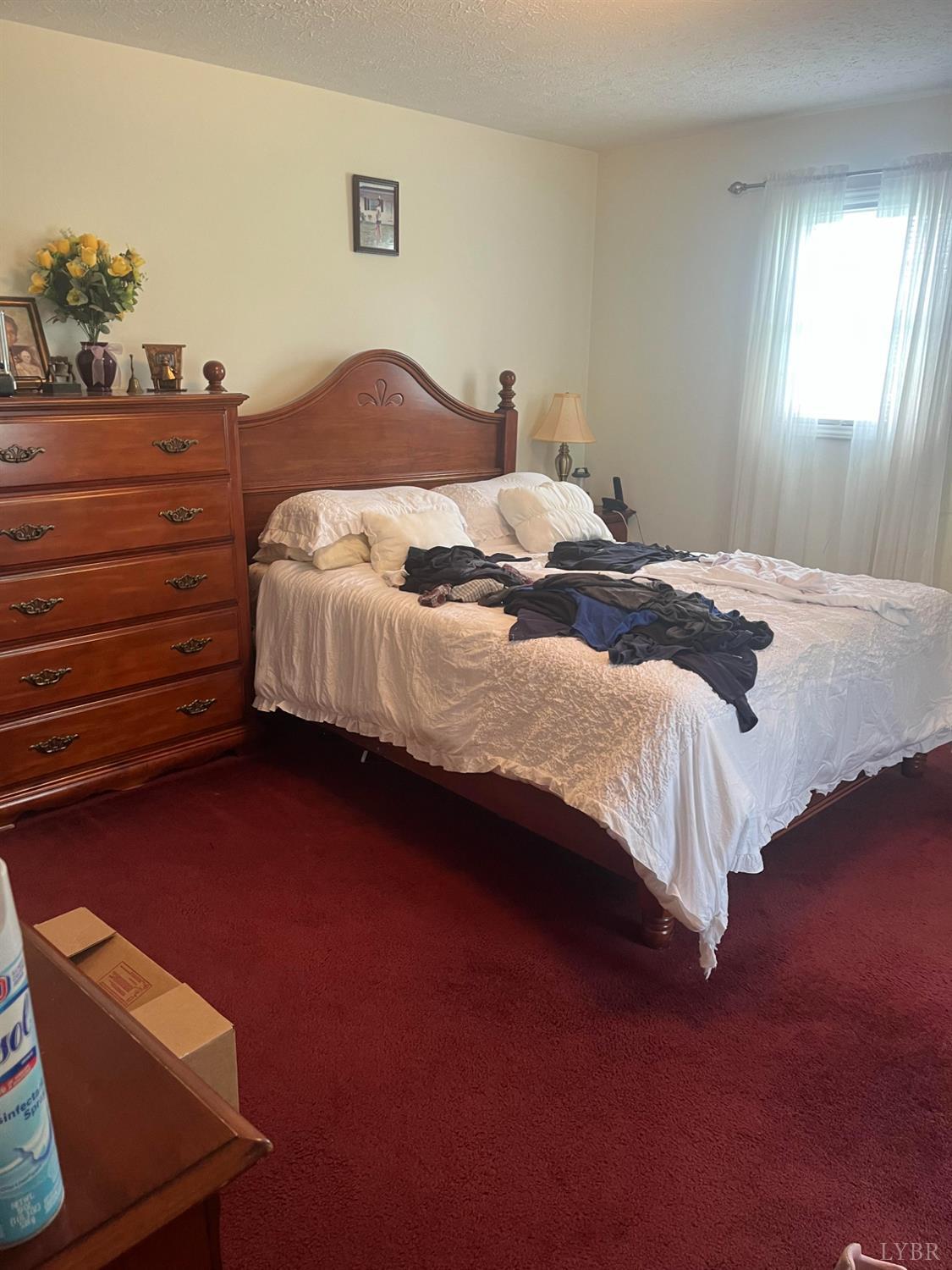 2135 Spring Garden Road Chatham, VA 24531 - Photo 9 of 18 a bedroom with a bed and window