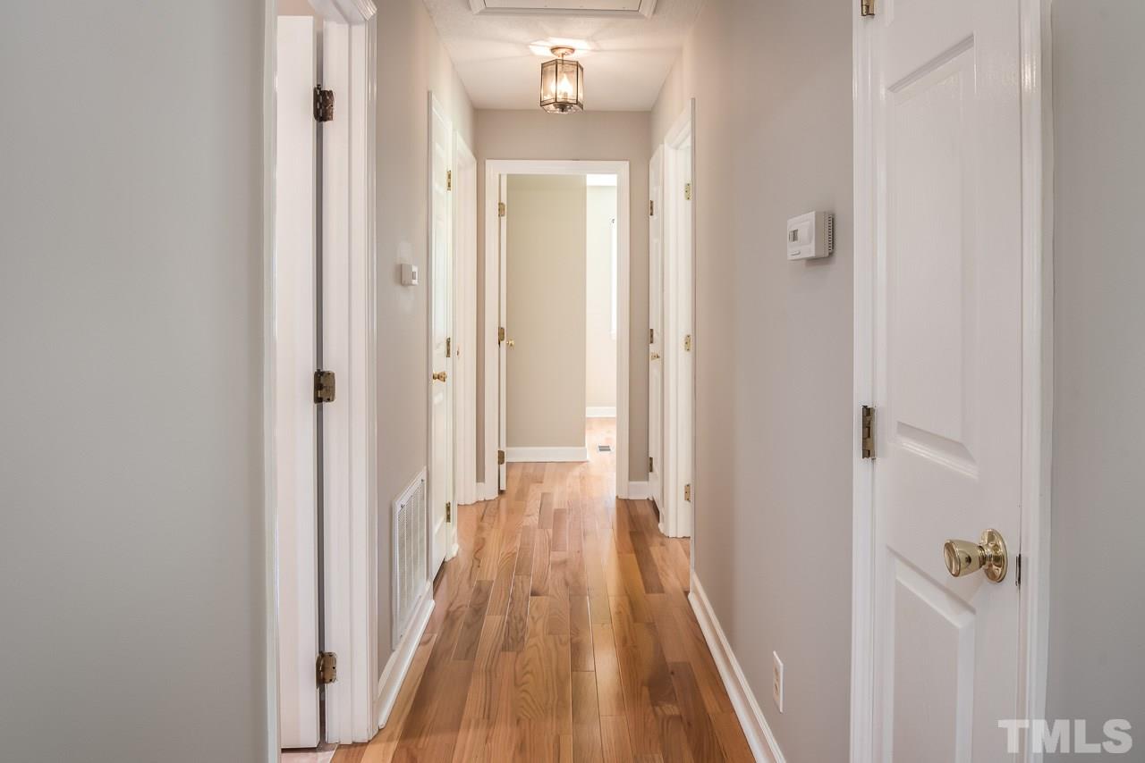 3208 Sparger Road Durham, NC 27705 - Photo 19 of 25 Hallway leading to bedrooms.