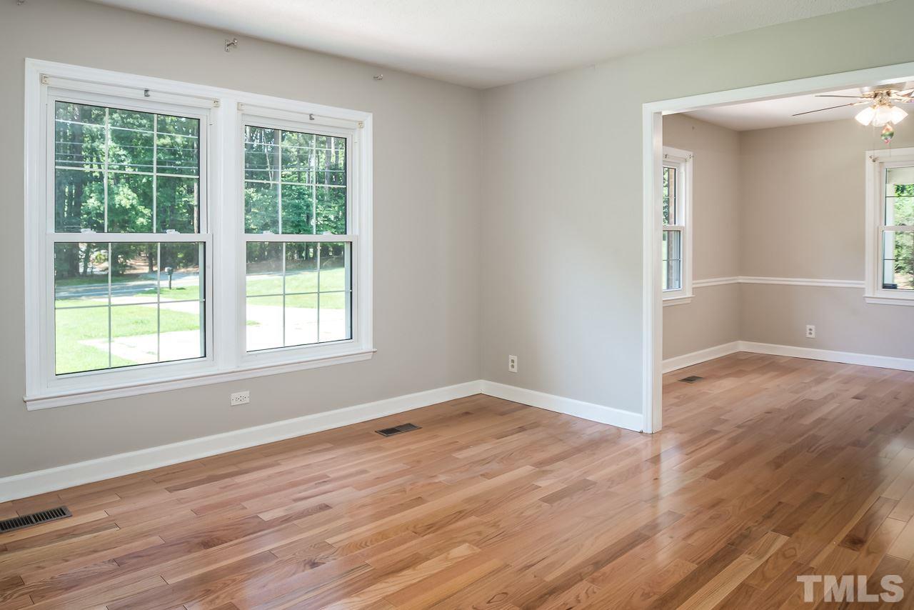 3208 Sparger Road Durham, NC 27705 - Photo 5 of 25 Living Room looking into Dining Room