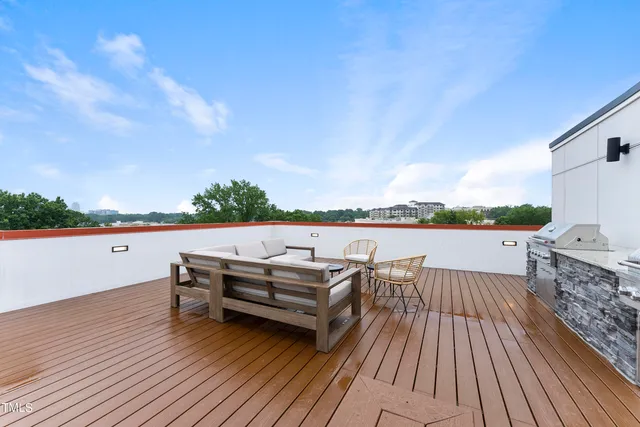 a view of roof deck with patio