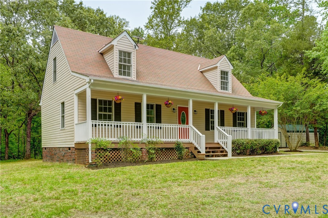 3820 Mt Pleasant Road Providence Forge, VA 23140 - Photo 25 of 40 a front view of a house with a yard