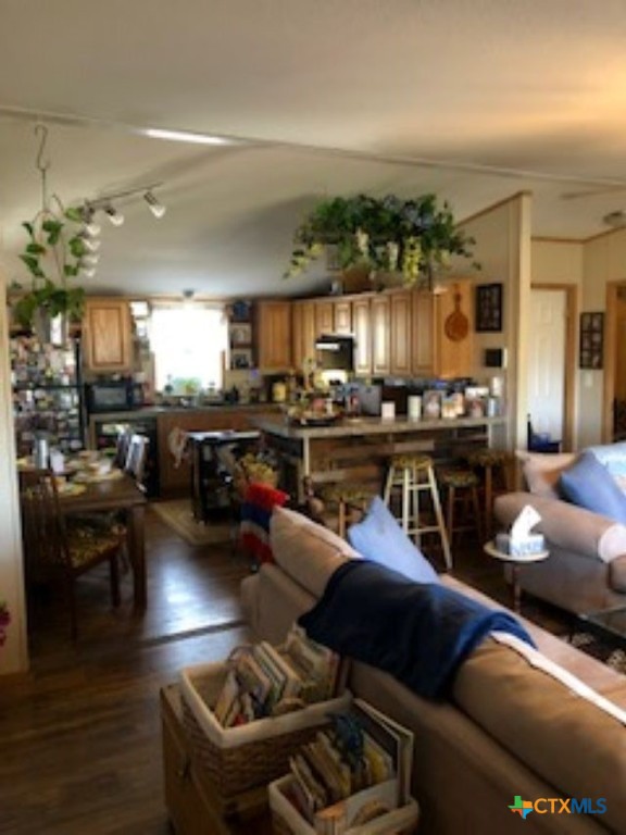 1188 Haeckerville Road Cibolo, TX 78108 - Photo 4 of 15 a living room with furniture and kitchen view