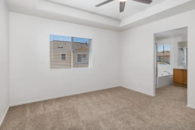a bathroom with a granite countertop sink mirror and double