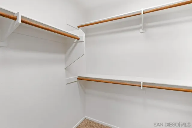 a bathroom with a white marble shower