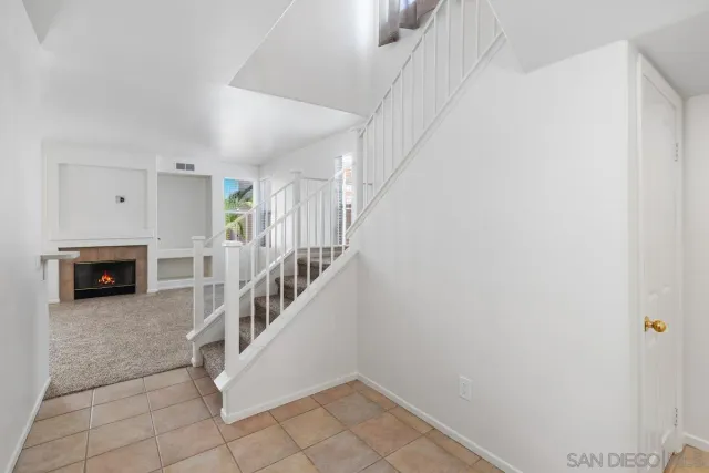 a view of entryway and hall with a window