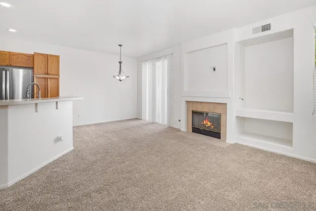 a view of a livingroom with a fireplace
