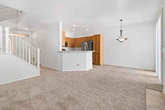 a view of a kitchen with a sink