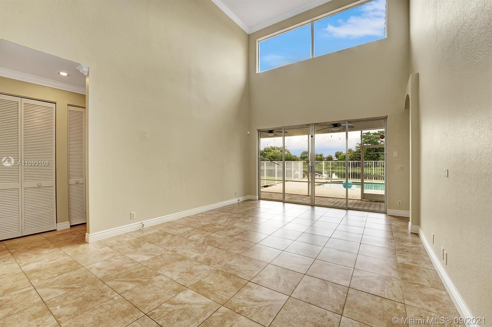 18672 Sea Turtle Lane Boca Raton, FL 33498 - Photo 3 of 44 a view of an empty room and window