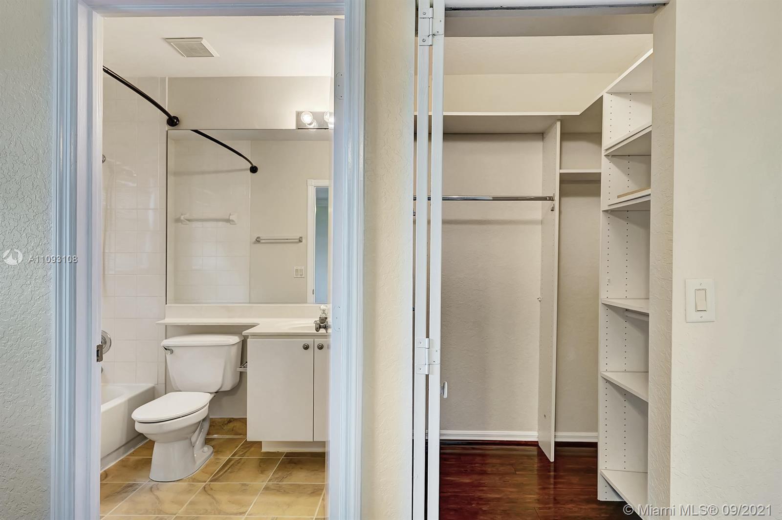 18672 Sea Turtle Lane Boca Raton, FL 33498 - Photo 29 of 44 a bathroom view of a toilet and a shower