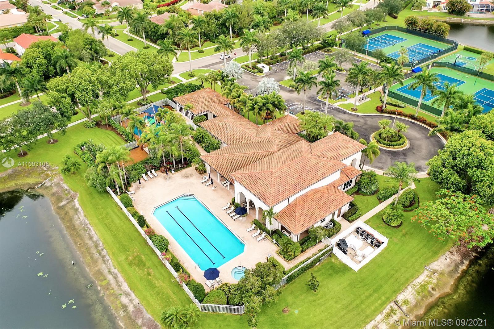 18672 Sea Turtle Lane Boca Raton, FL 33498 - Photo 42 of 44 an aerial view of a residential houses with yard