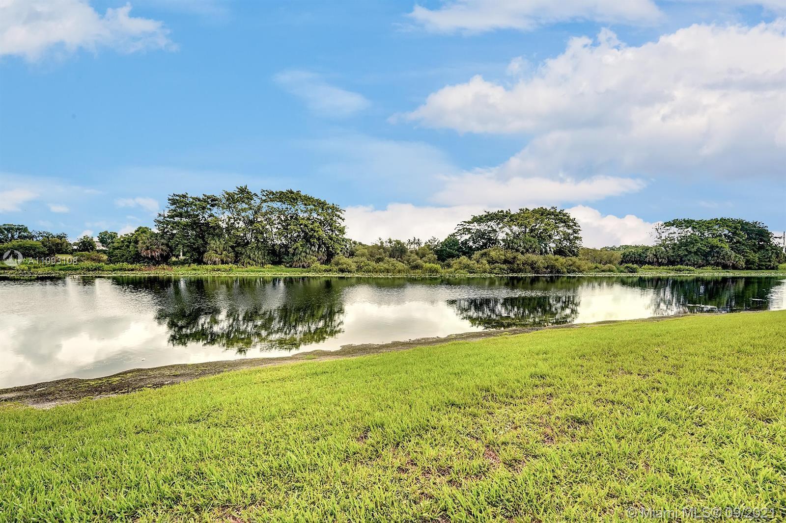 18672 Sea Turtle Lane Boca Raton, FL 33498 - Photo 43 of 44 a view of a lake