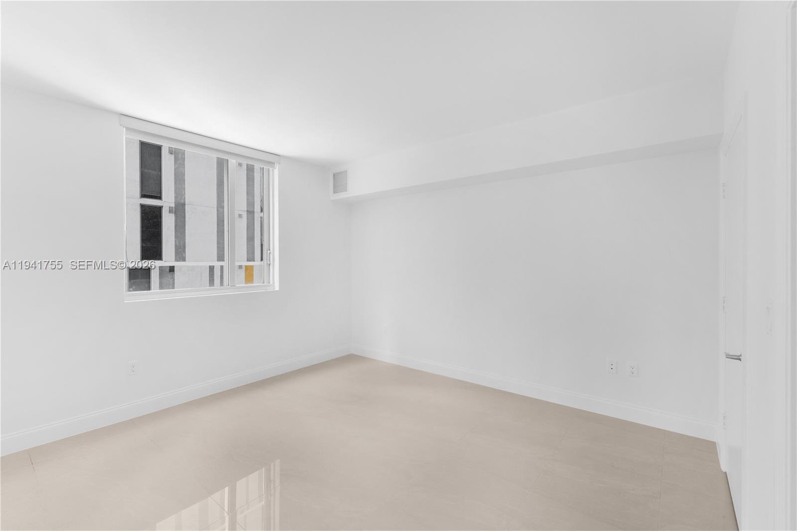 55 Southeast 6th Street, Unit 1202 Miami, FL 33131 - Photo 18 of 45 a view of an empty room