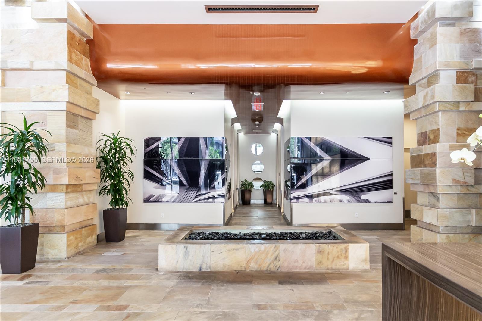 55 Southeast 6th Street, Unit 1202 Miami, FL 33131 - Photo 41 of 45 a view of living room with kitchen and living room