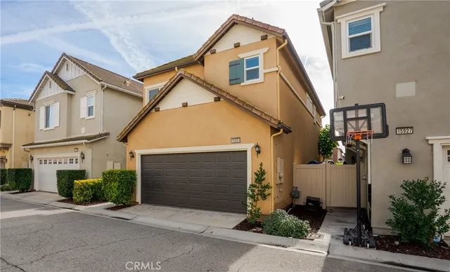 front view of a house with a street