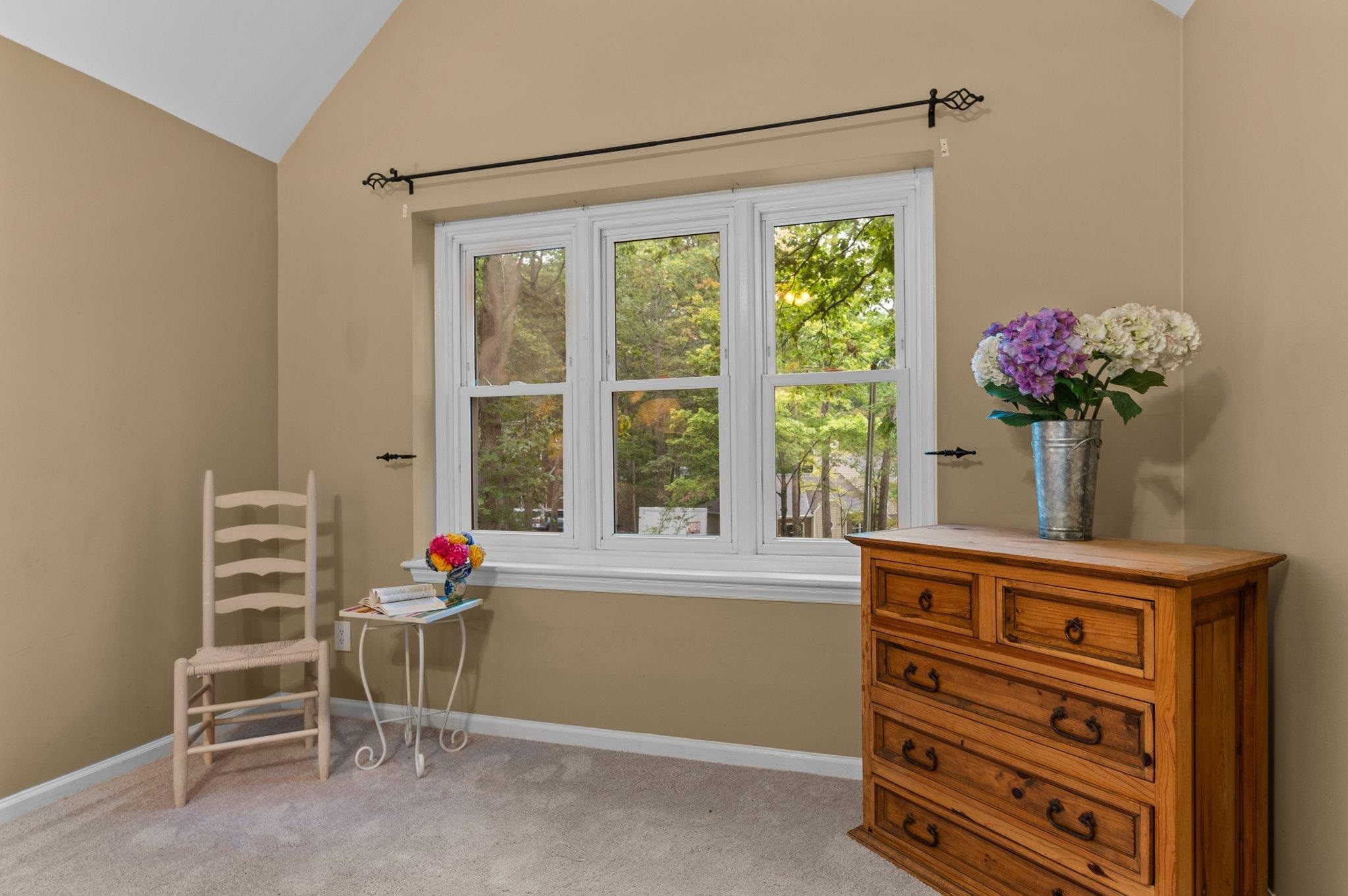 7818 Breckon Way Raleigh, NC 27615 - Photo 20 of 27 a view of a room with a window and furniture