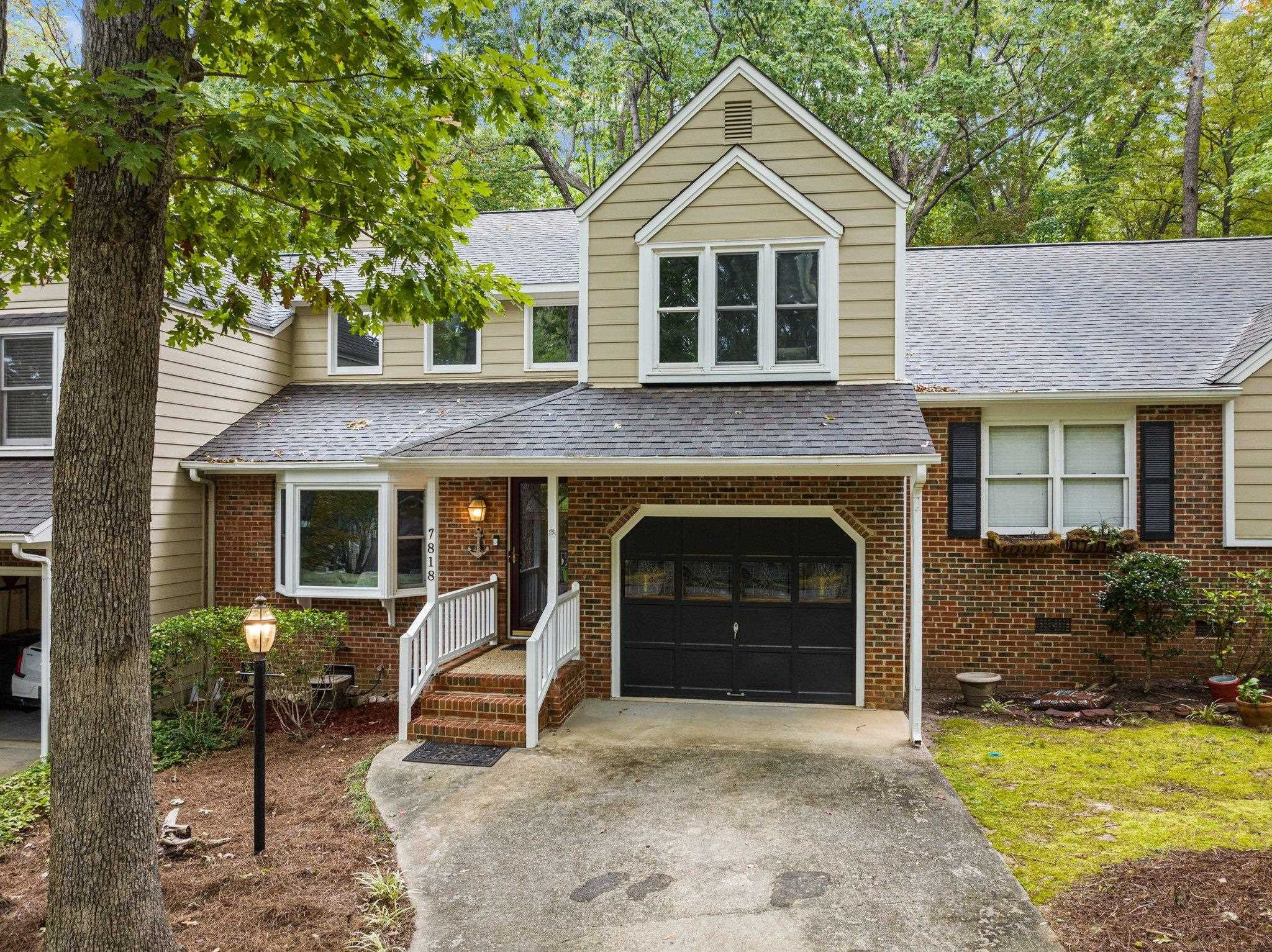 7818 Breckon Way Raleigh, NC 27615 - Photo 2 of 27 a house view with a outdoor space