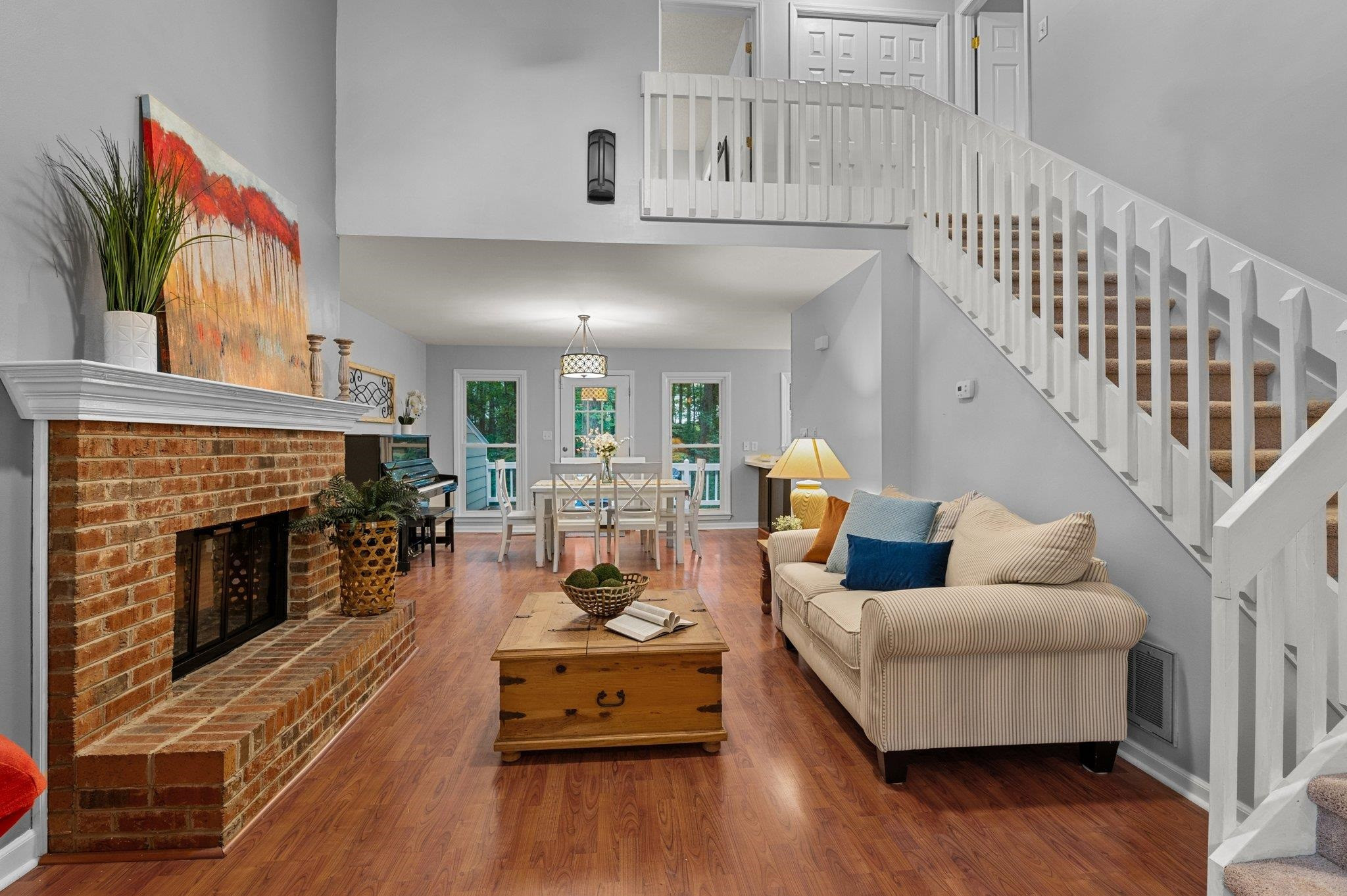 7818 Breckon Way Raleigh, NC 27615 - Photo 6 of 27 a living room with furniture and a fireplace