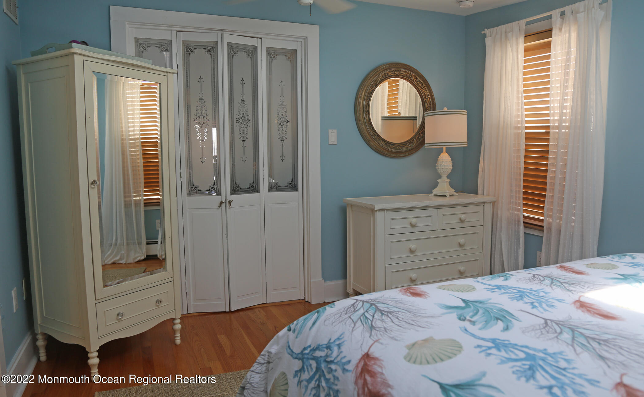 87 Cookman Avenue Ocean Grove, NJ 07756 - Photo 11 of 19 a bedroom with a bed and a dresser