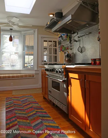 a kitchen with a stove and a microwave