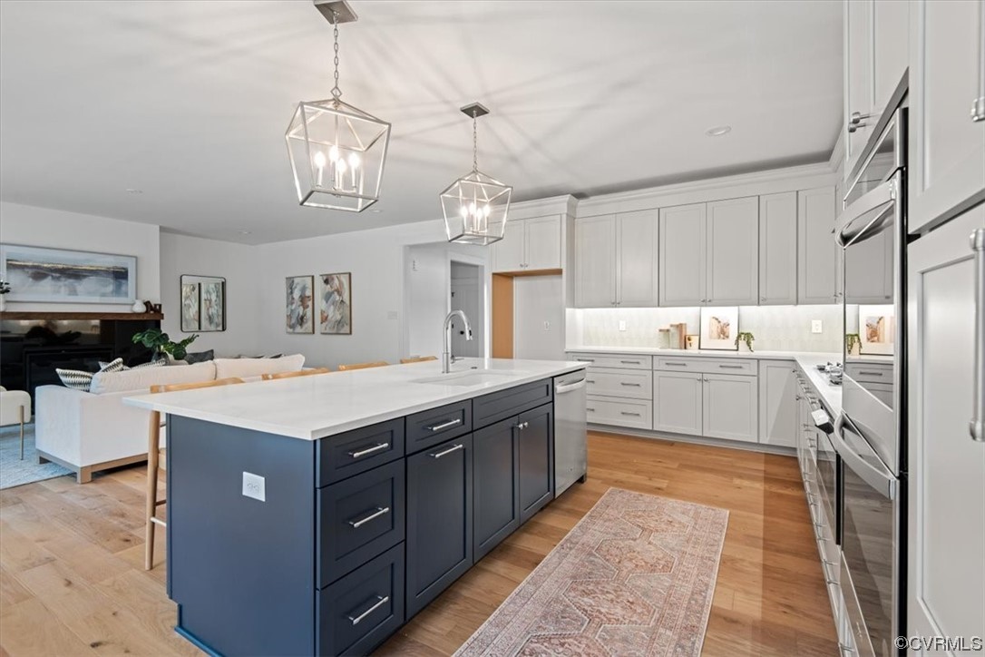 3652 West Rocketts Rdg Court Goochland, VA 23063 - Photo 13 of 50 a kitchen with a sink counter top space cabinets and stainless steel appliances