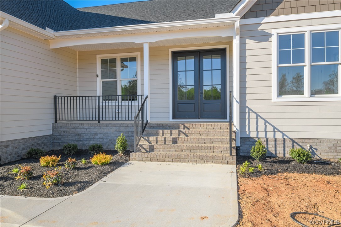 3652 West Rocketts Rdg Court Goochland, VA 23063 - Photo 2 of 50 a view of a house with a small yard and wooden floor and fence
