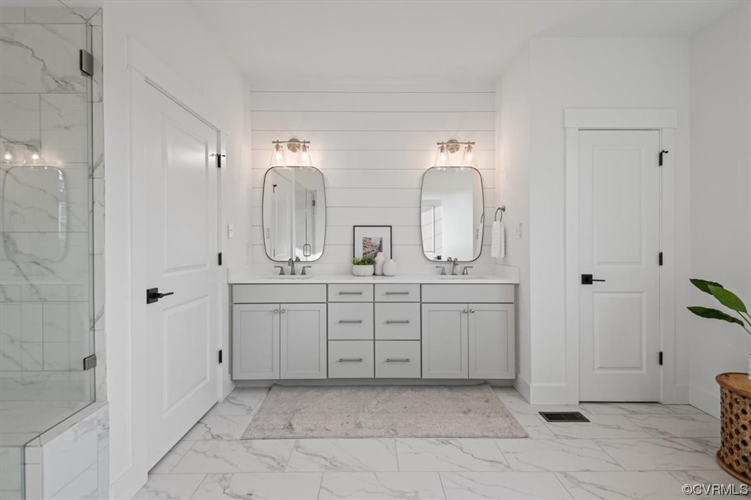 3652 West Rocketts Rdg Court Goochland, VA 23063 - Photo 25 of 50 a spacious bathroom with a double vanity sink a mirror and a shower