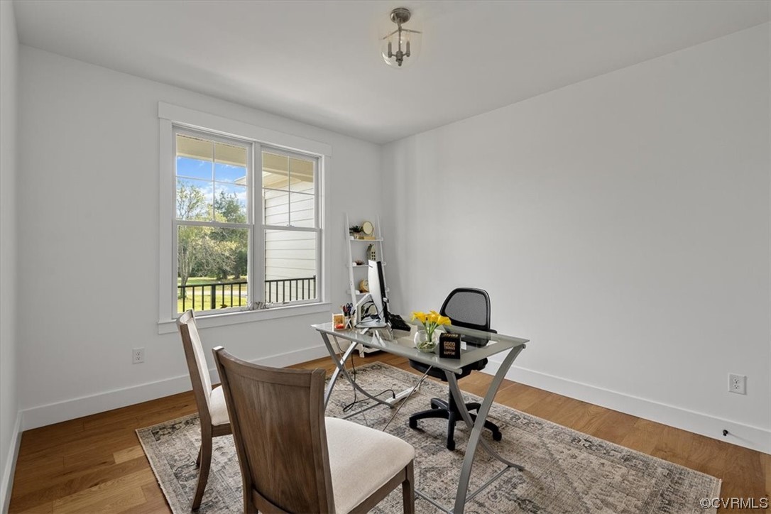 3652 West Rocketts Rdg Court Goochland, VA 23063 - Photo 29 of 50 a workspace with table chair and a window