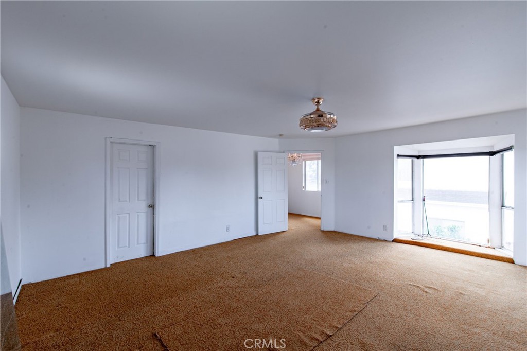 16413 Downey Avenue Paramount, CA 90723 - Photo 22 of 41 Large Bedroom