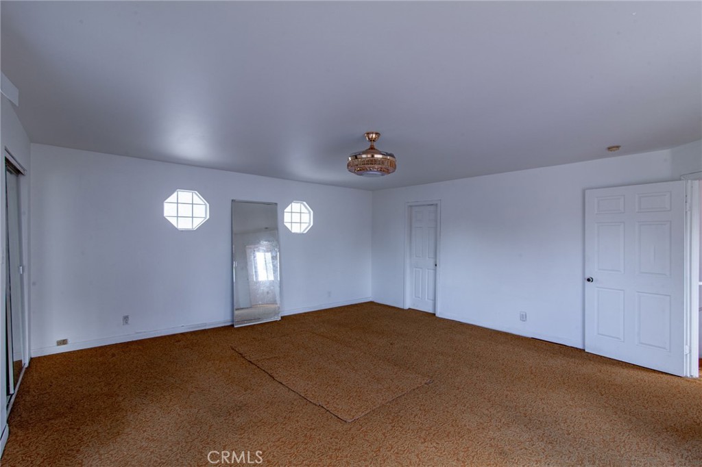 16413 Downey Avenue Paramount, CA 90723 - Photo 24 of 41 Large Bedroom