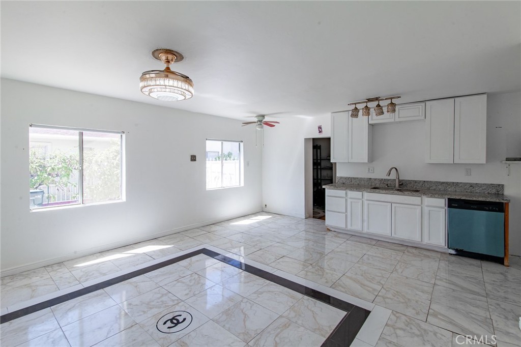 16413 Downey Avenue Paramount, CA 90723 - Photo 8 of 41 Front Room towards Kitchen