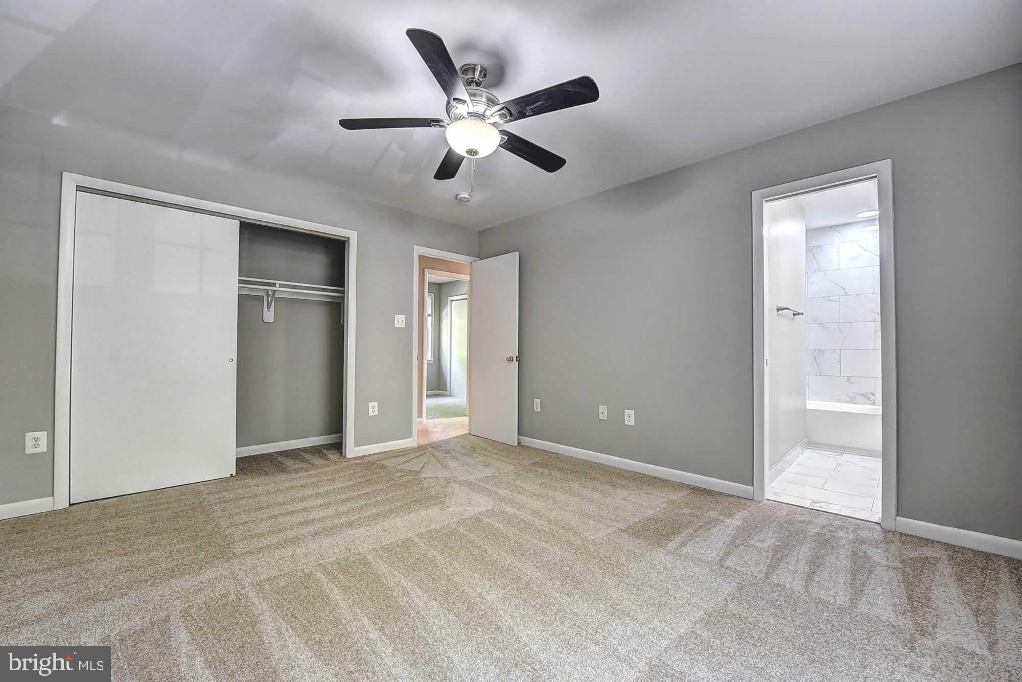 2226 Gunsmith Square Reston, VA 20191 - Photo 22 of 35 a view of an empty room with a ceiling fan