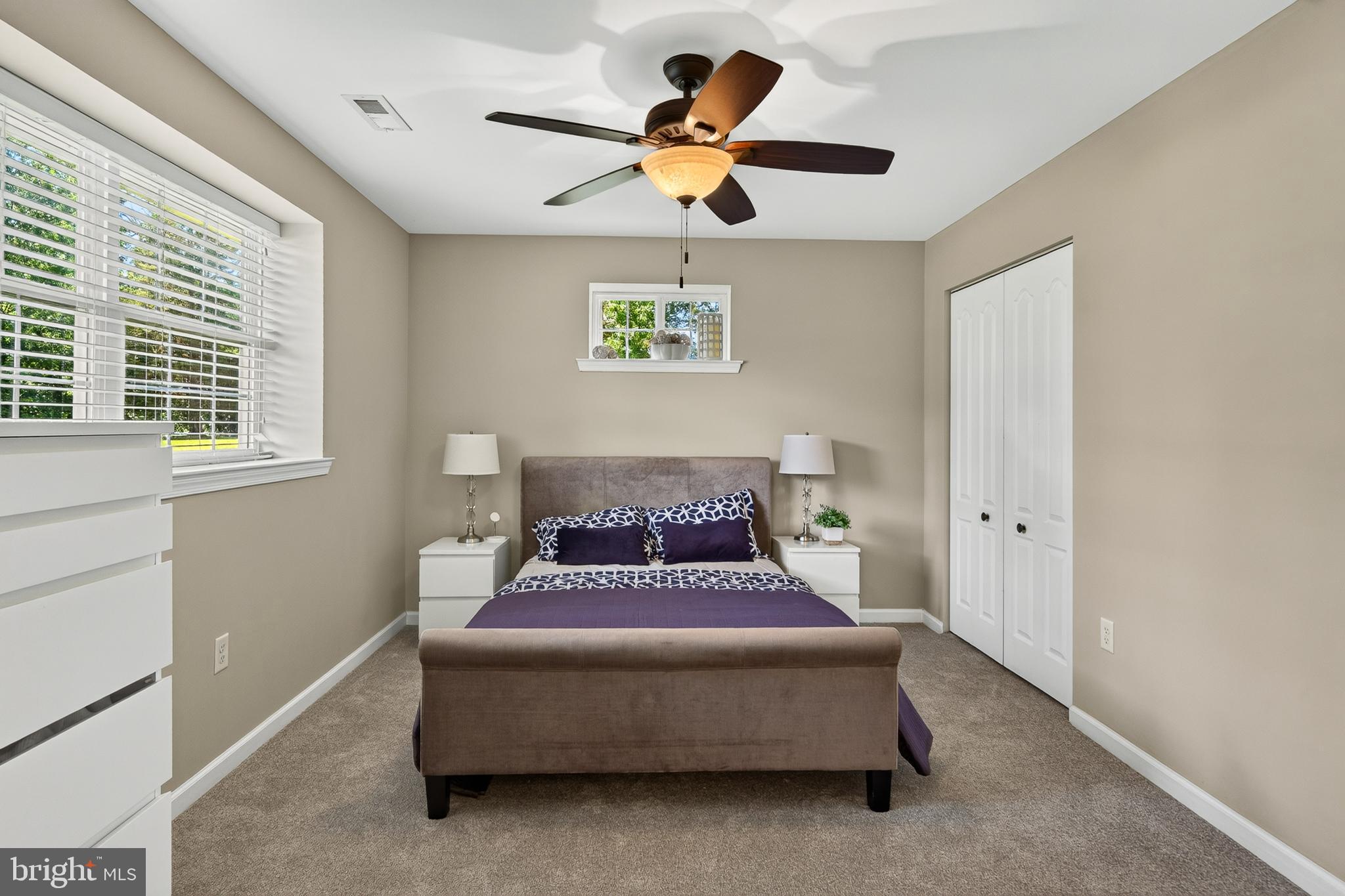 246 Oak Park Road Hatfield, PA 19440 - Photo 15 of 45 a spacious bedroom with a bed and a window