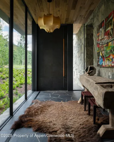 a view of a livingroom with furniture and window