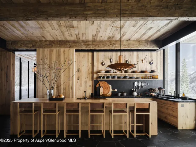 a kitchen with a stove and a refrigerator