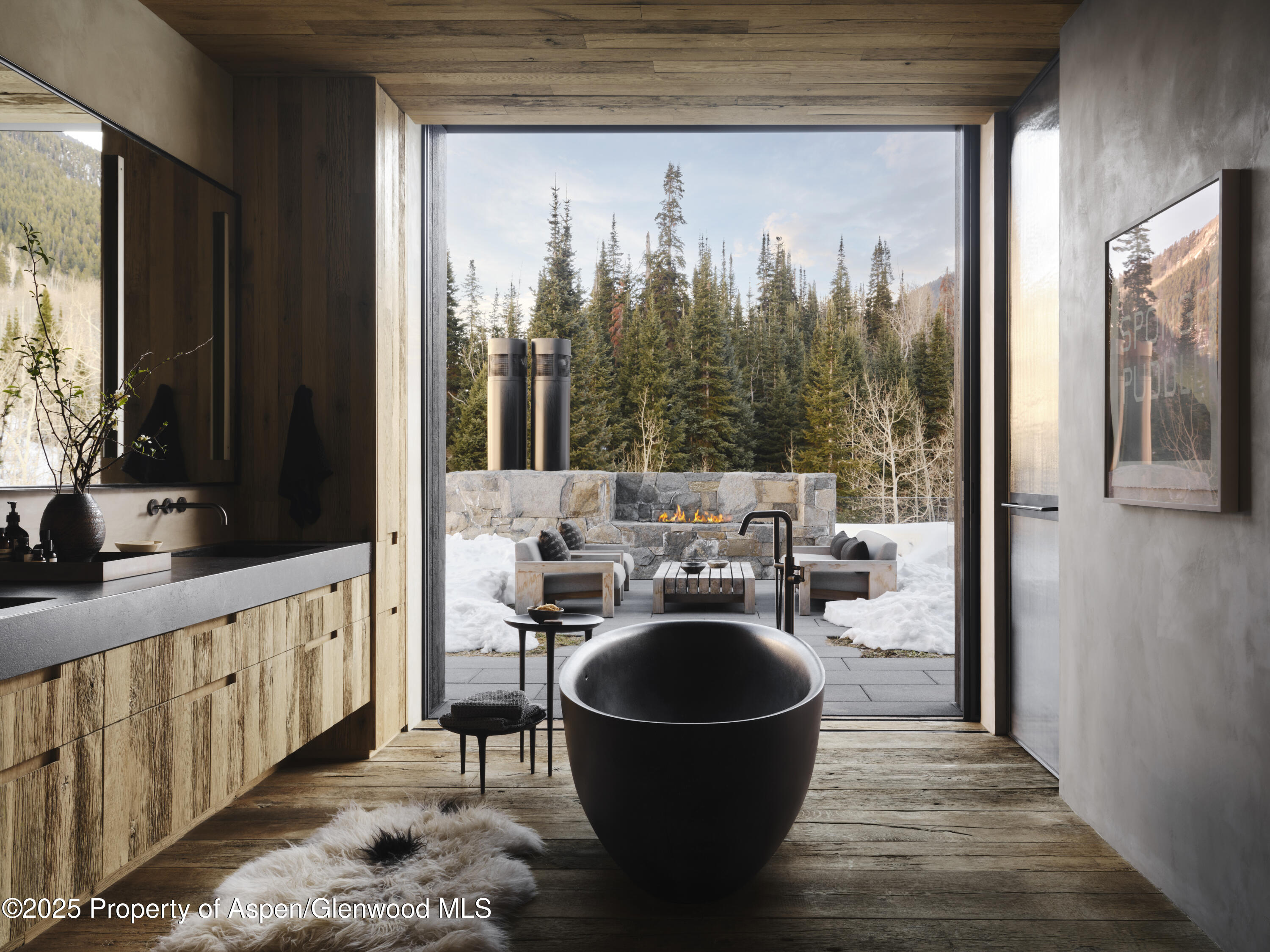 724 North Hayden Road Aspen, CO 81611 - Photo 10 of 35 a living room with furniture and a floor to ceiling window