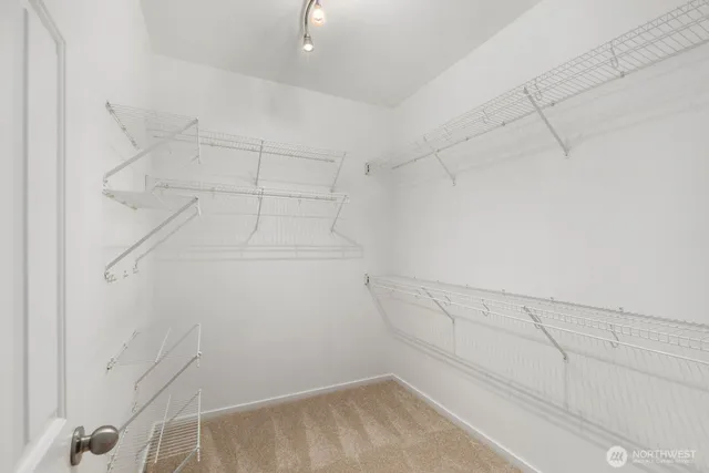 a view of a room with racks on the wall